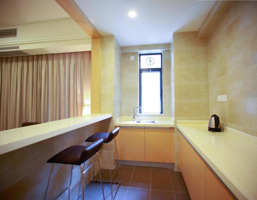 Xcellent International Serviced Apartment Cantón Habitación foto
